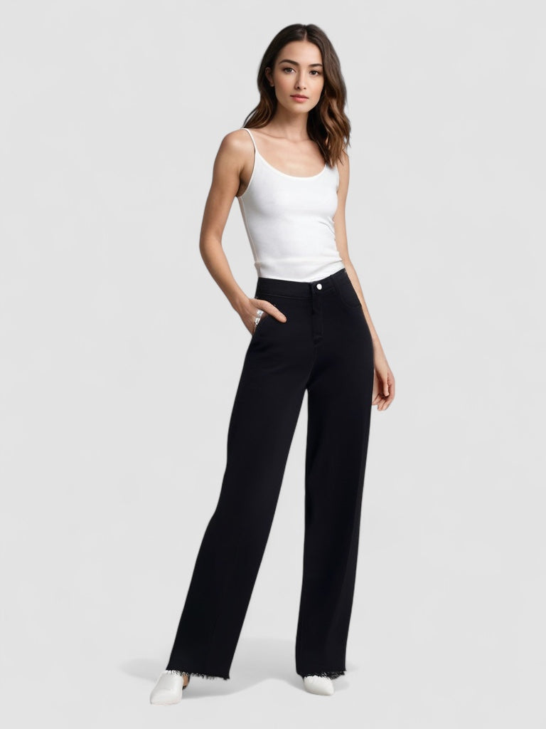 Tilda Stockholm | Elegant Svart Jeans med Rå Finish